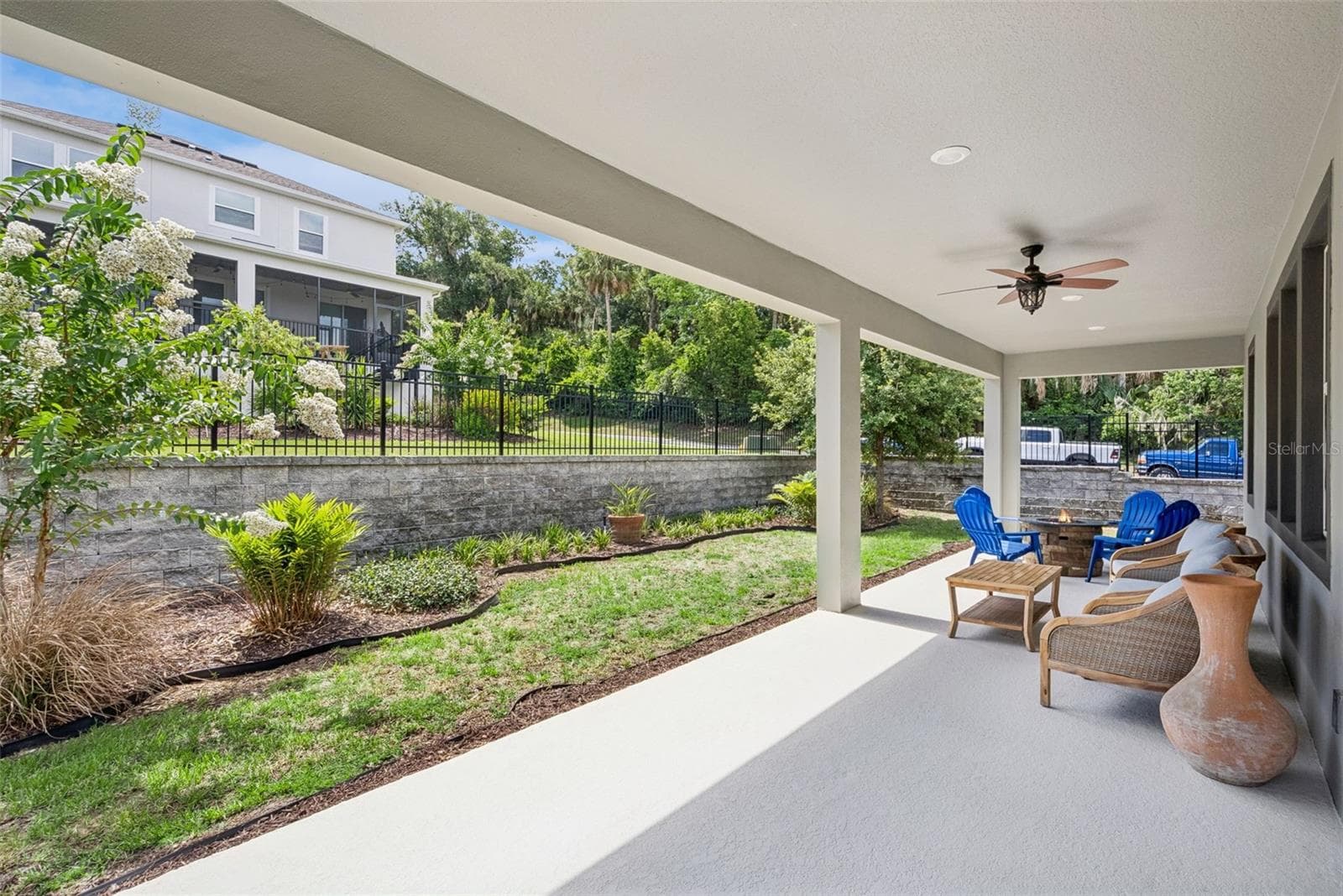 Rear elevation with covered outdoor living area - 1235 DORA PARC LN, MOUNT DORA