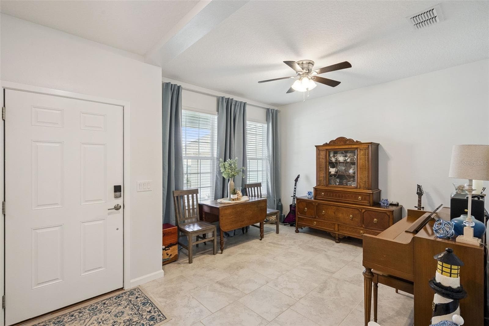 Entry and bonus room transition - 1235 DORA PARC LN, MOUNT DORA