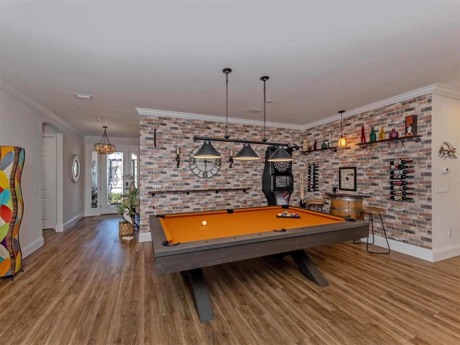 Dining Room used as game room with Faux Brick Wallpaper - 155 TOSCAVILLA BLVD, NOKOMIS