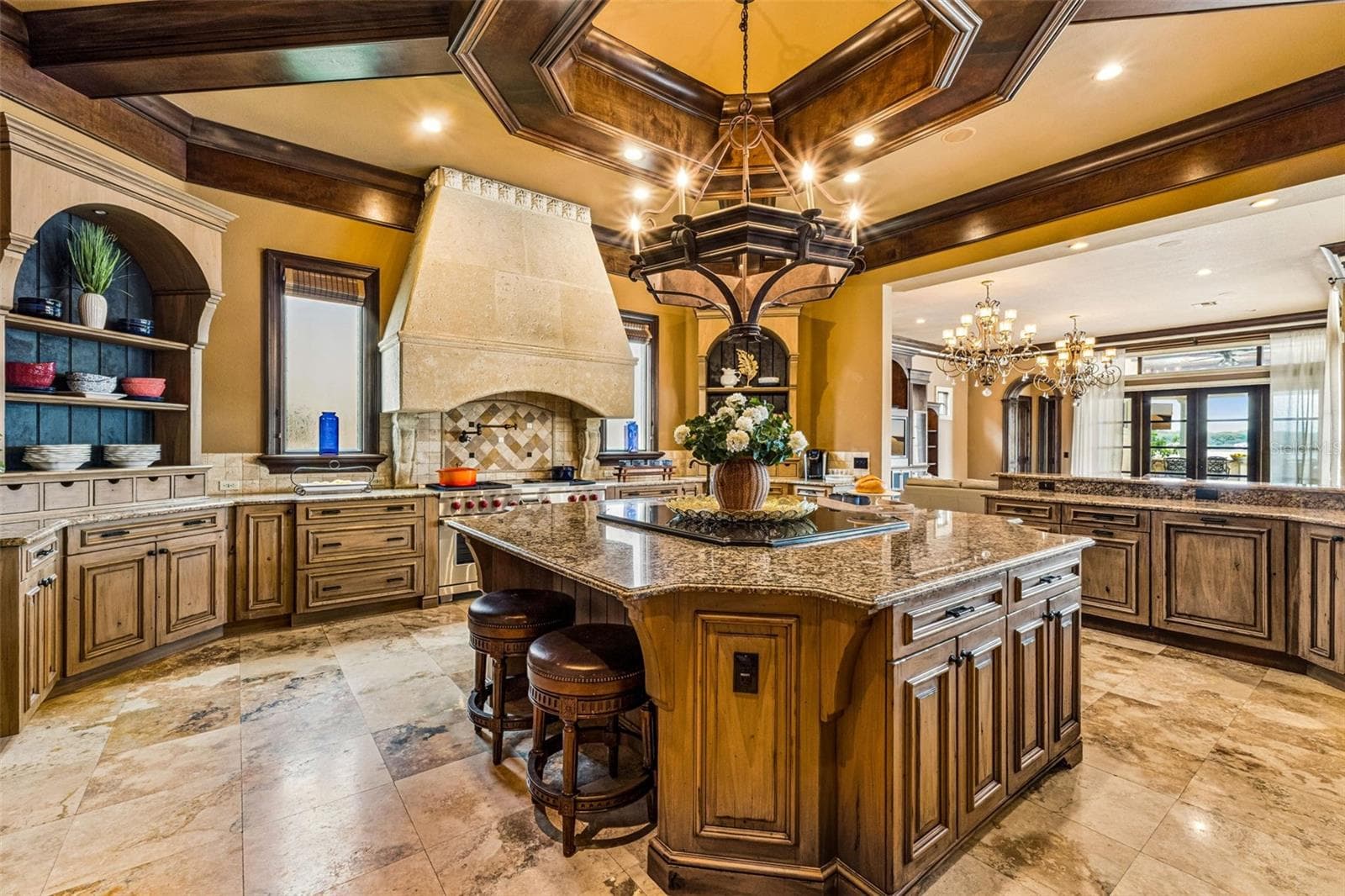 Kitchen with a grand island perfect for hosting & entertaining! - 16619 AREZO CT, MONTVERDE