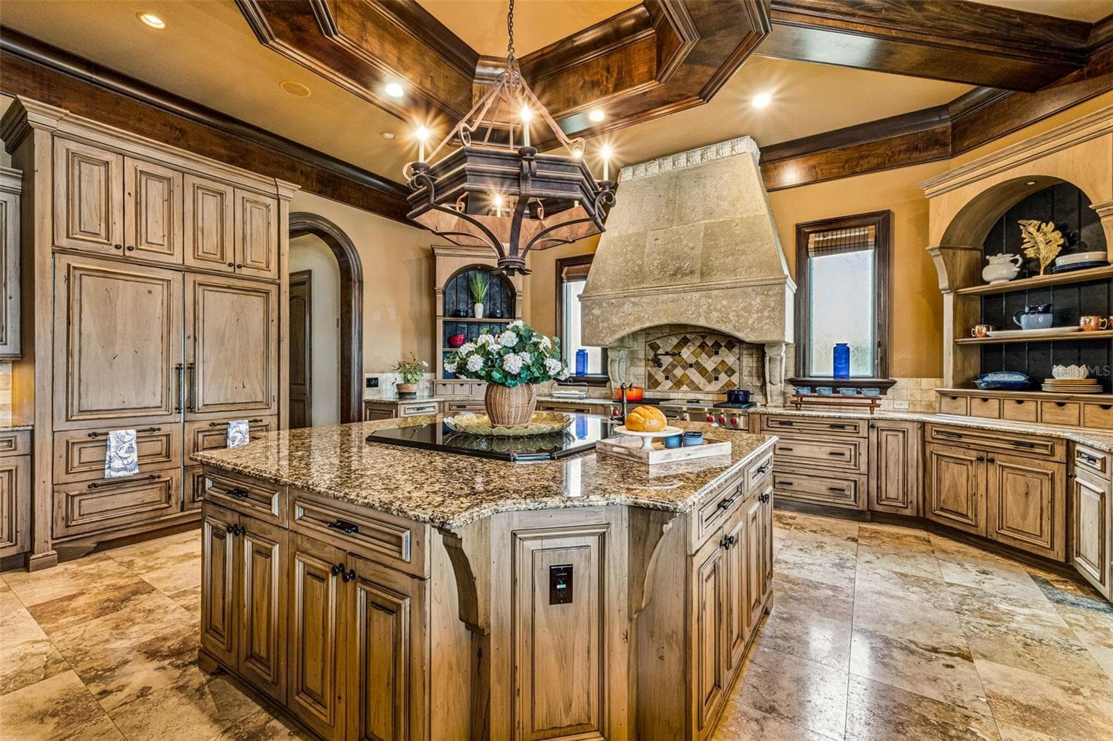 Kitchen with a grand island perfect for hosting & entertaining! - 16619 AREZO CT, MONTVERDE