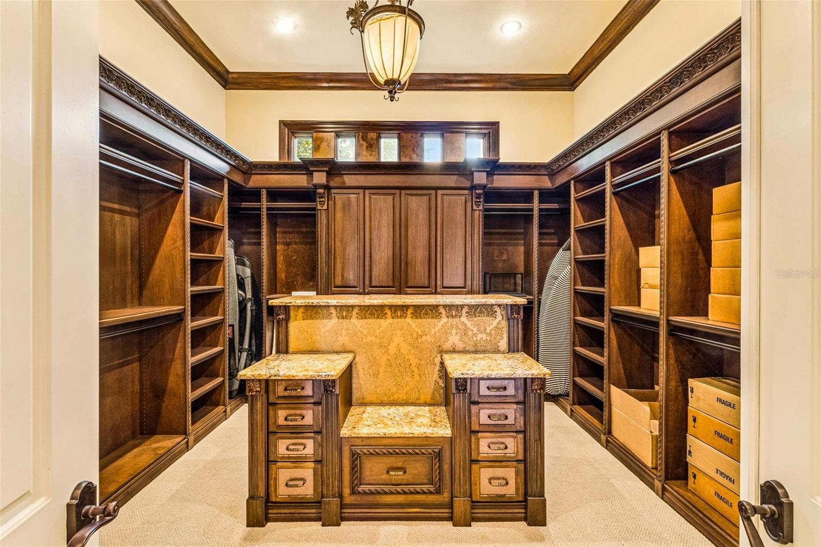 One of multiple closets in the primary suite - 16619 AREZO CT, MONTVERDE