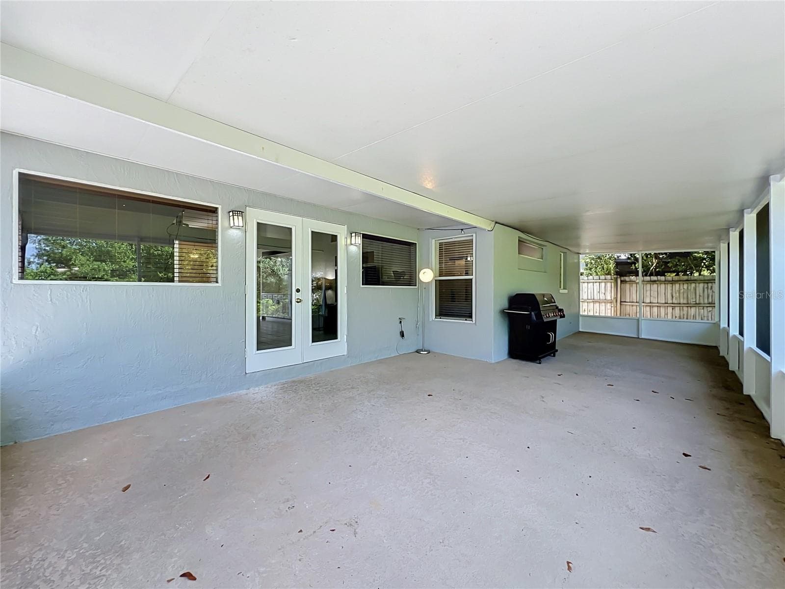 Large screened-in back porch. - 554 WHITTINGHAM PL, LAKE MARY