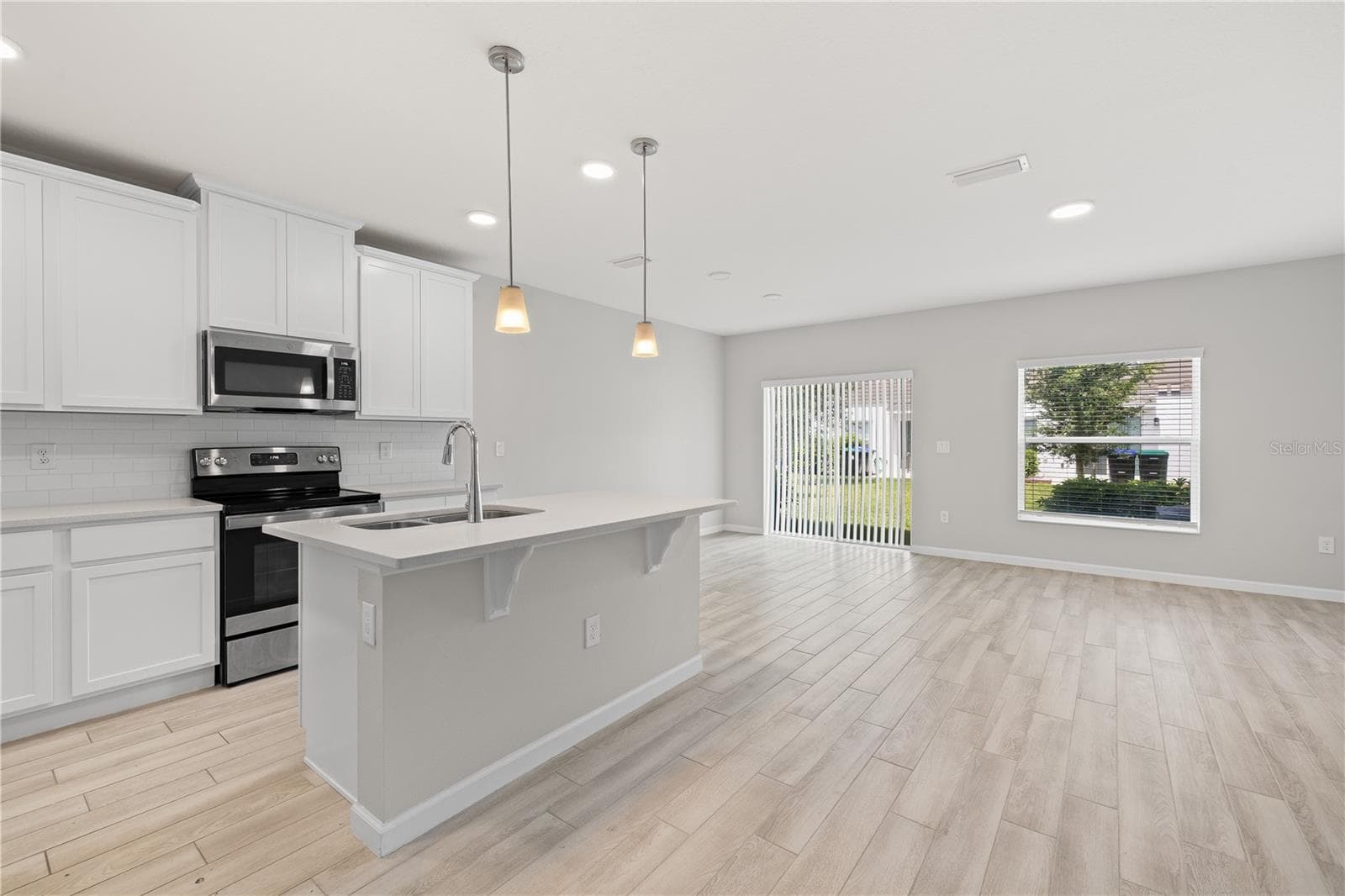 Kitchen and Dining Room - 14856 HARVEST ST, ORLANDO