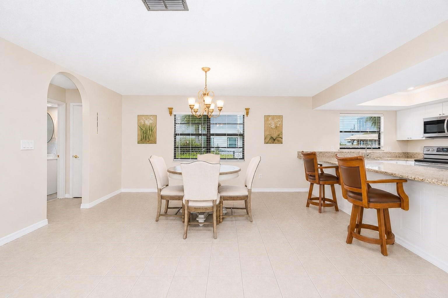 Dining and kitchen. - 13525 CLAUDIA DR, HUDSON