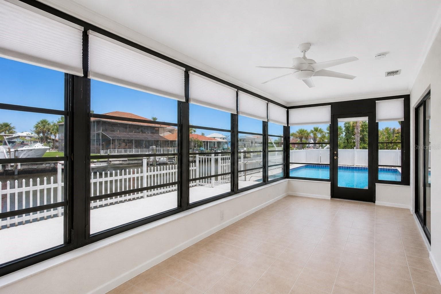 Air-conditioned, sunroom. - 13525 CLAUDIA DR, HUDSON