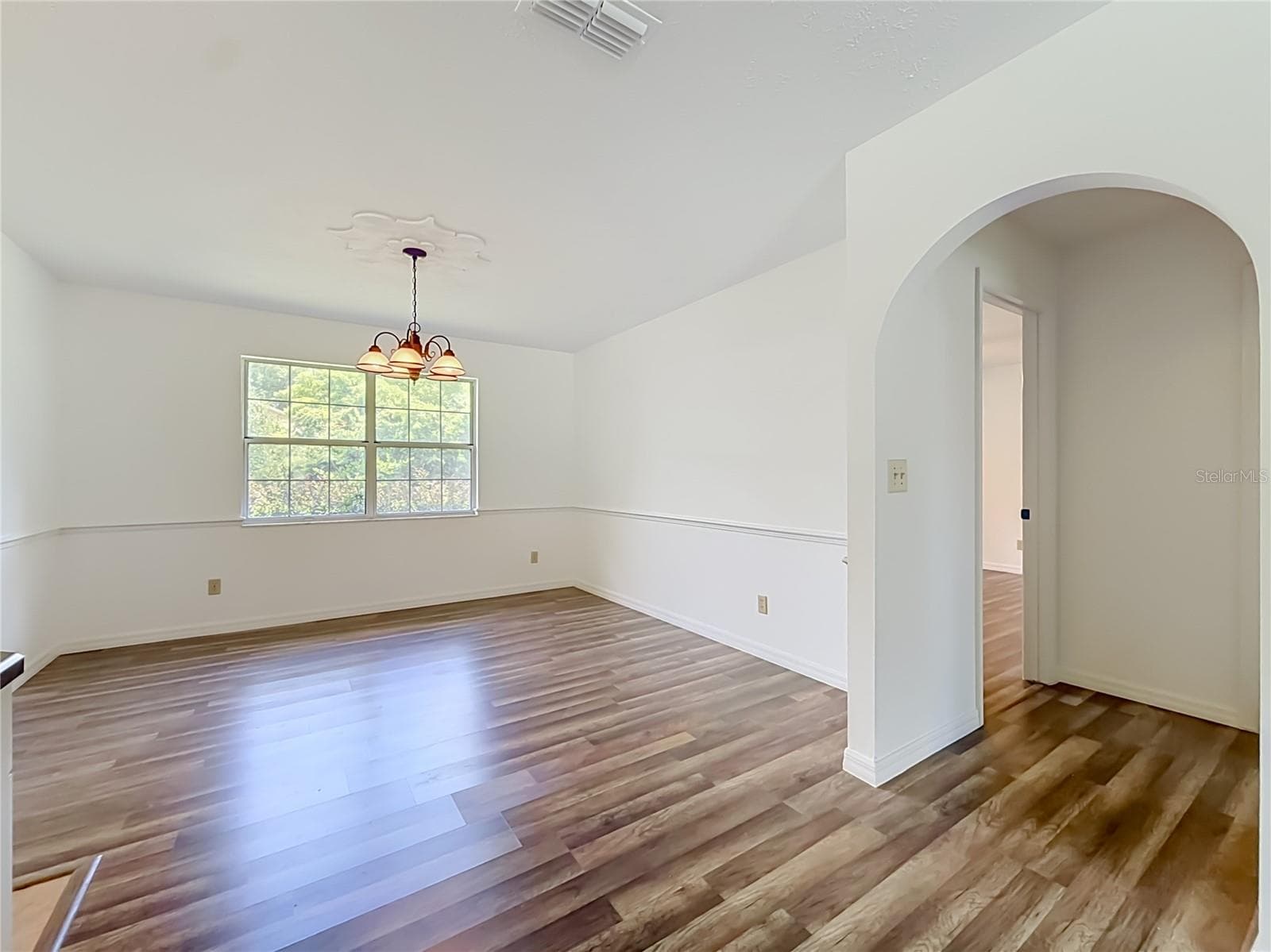 Formal Dinning area from Living room - 707 NE 46TH CT, OCALA