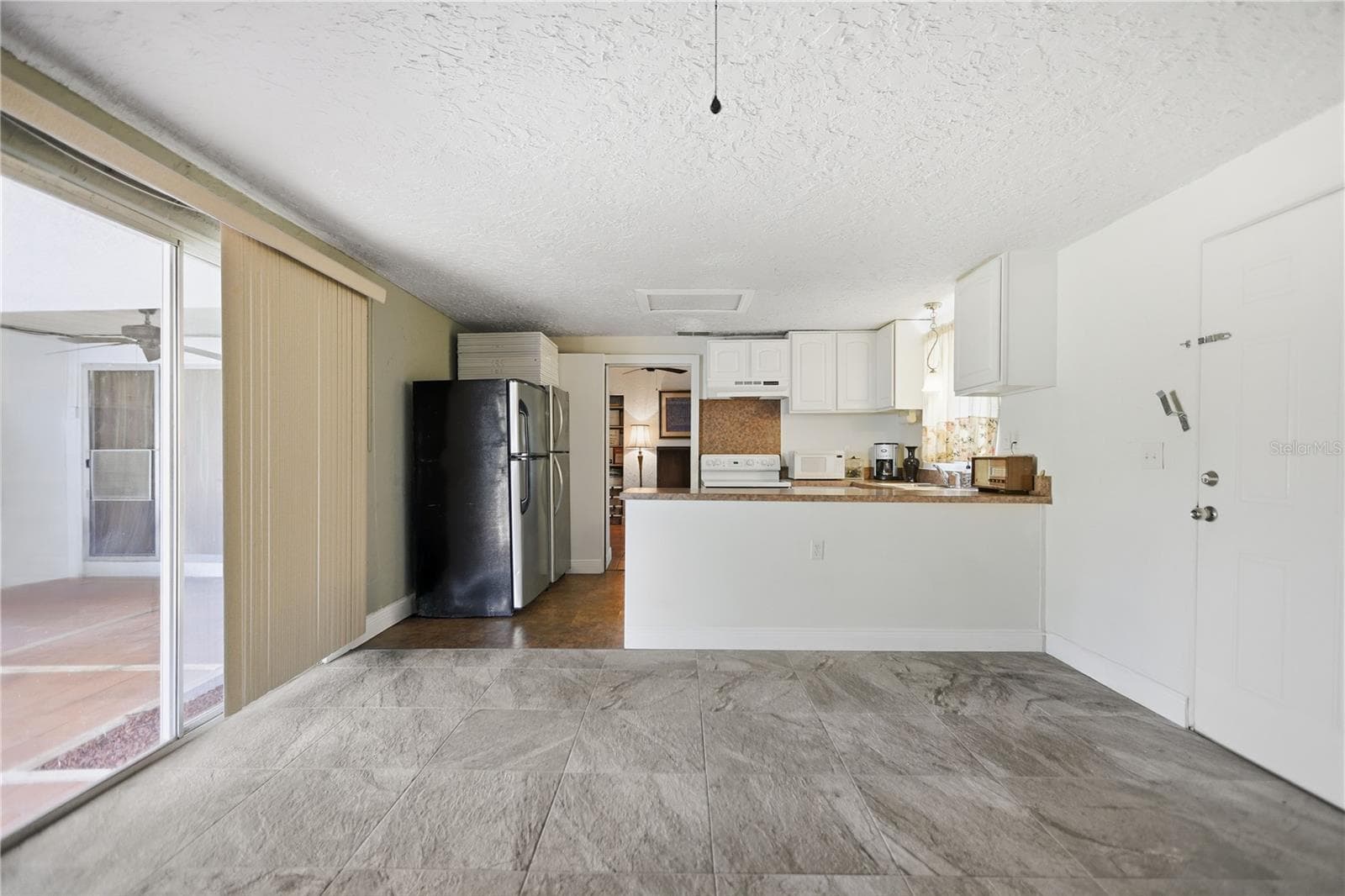 Mother in law/ living room/dining room combo - 120 VALENCIA RD, ROCKLEDGE
