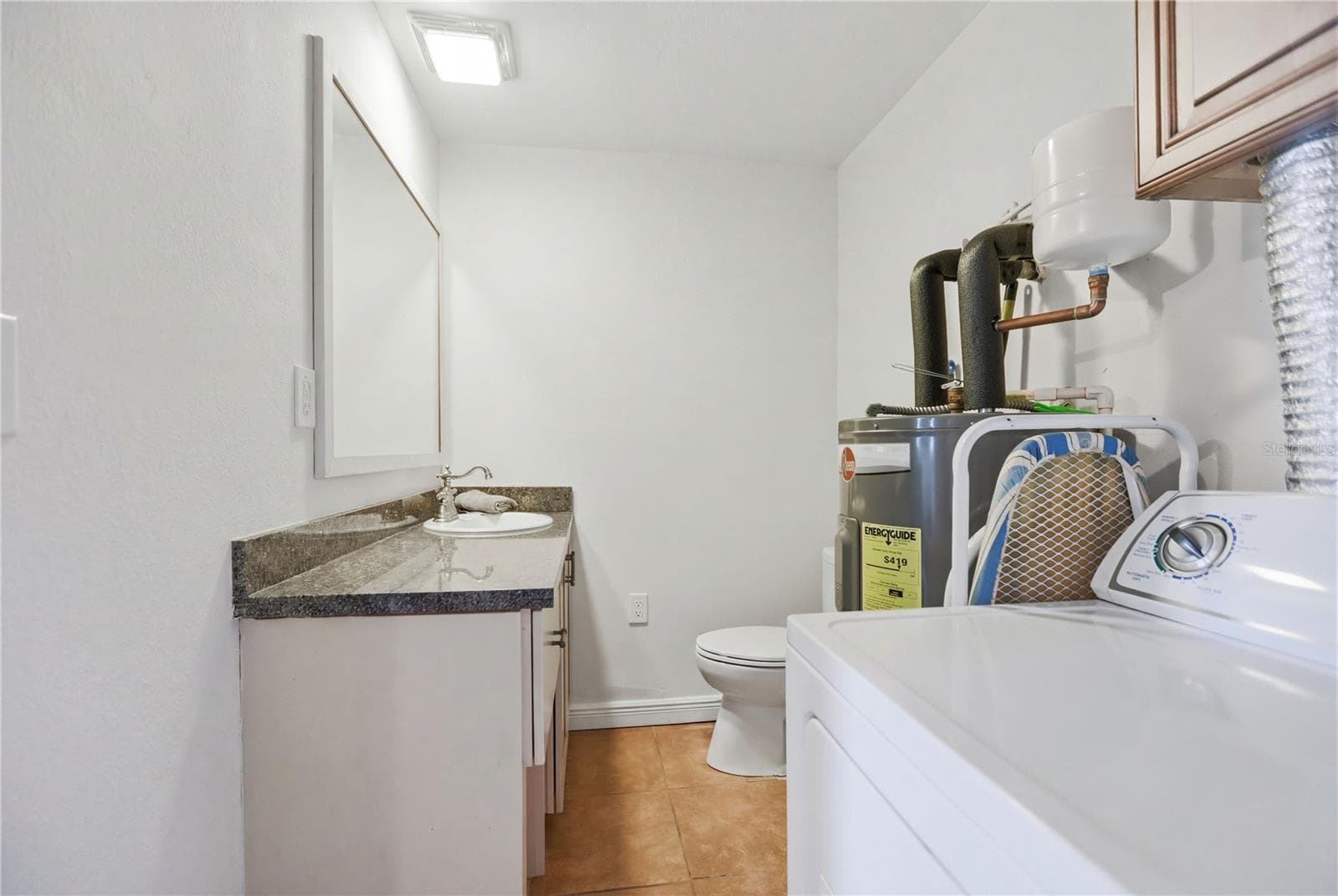 Half bathroom/Laundry room - 120 VALENCIA RD, ROCKLEDGE