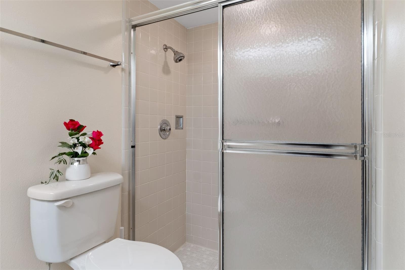 The master bathroom features a Step in Shower - 2102 FORESTER WAY, SPRING HILL