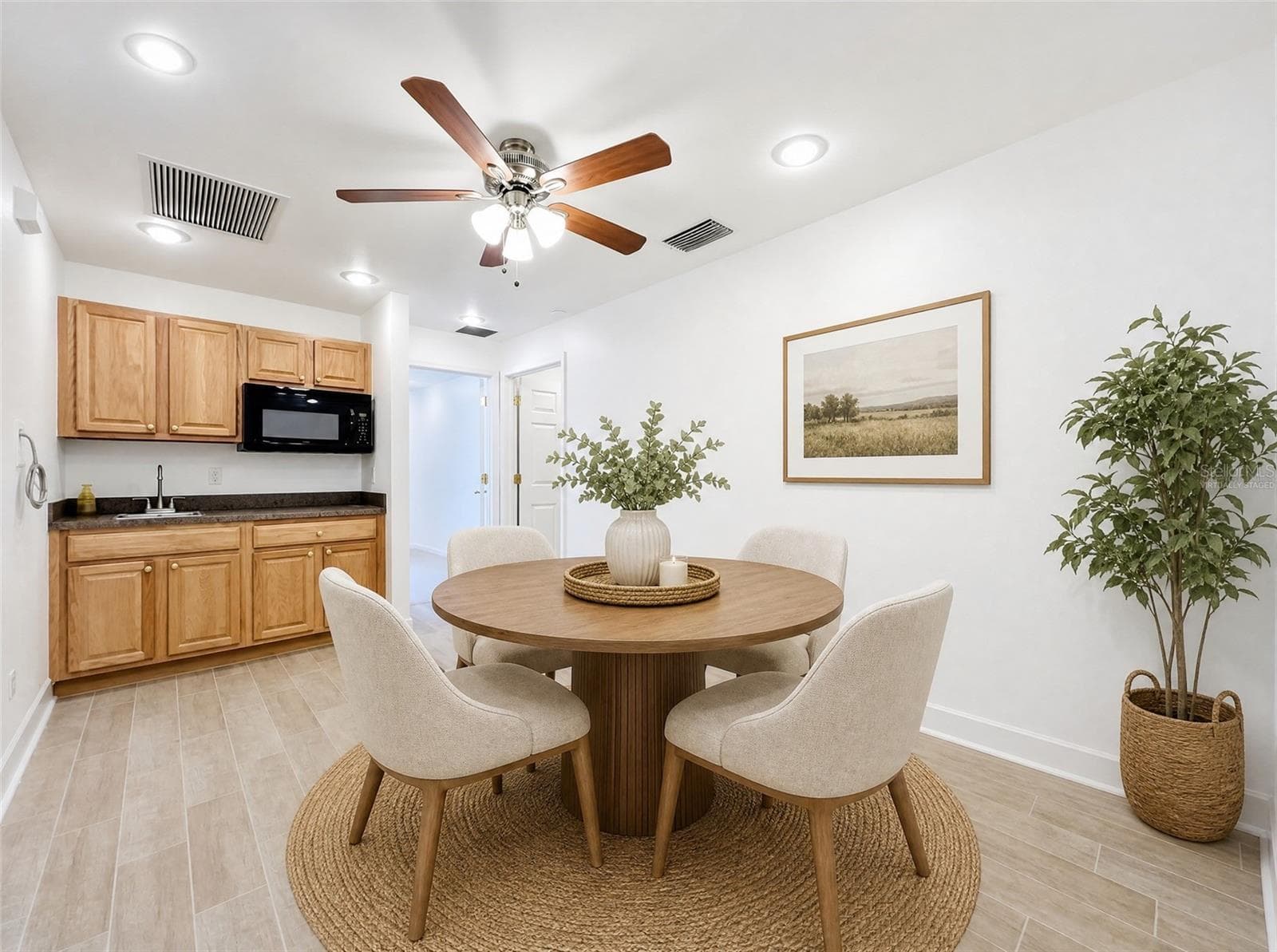 Virtually Staged Dinette MIL Suite side - 2300 PINE MEADOWS PL, CHULUOTA