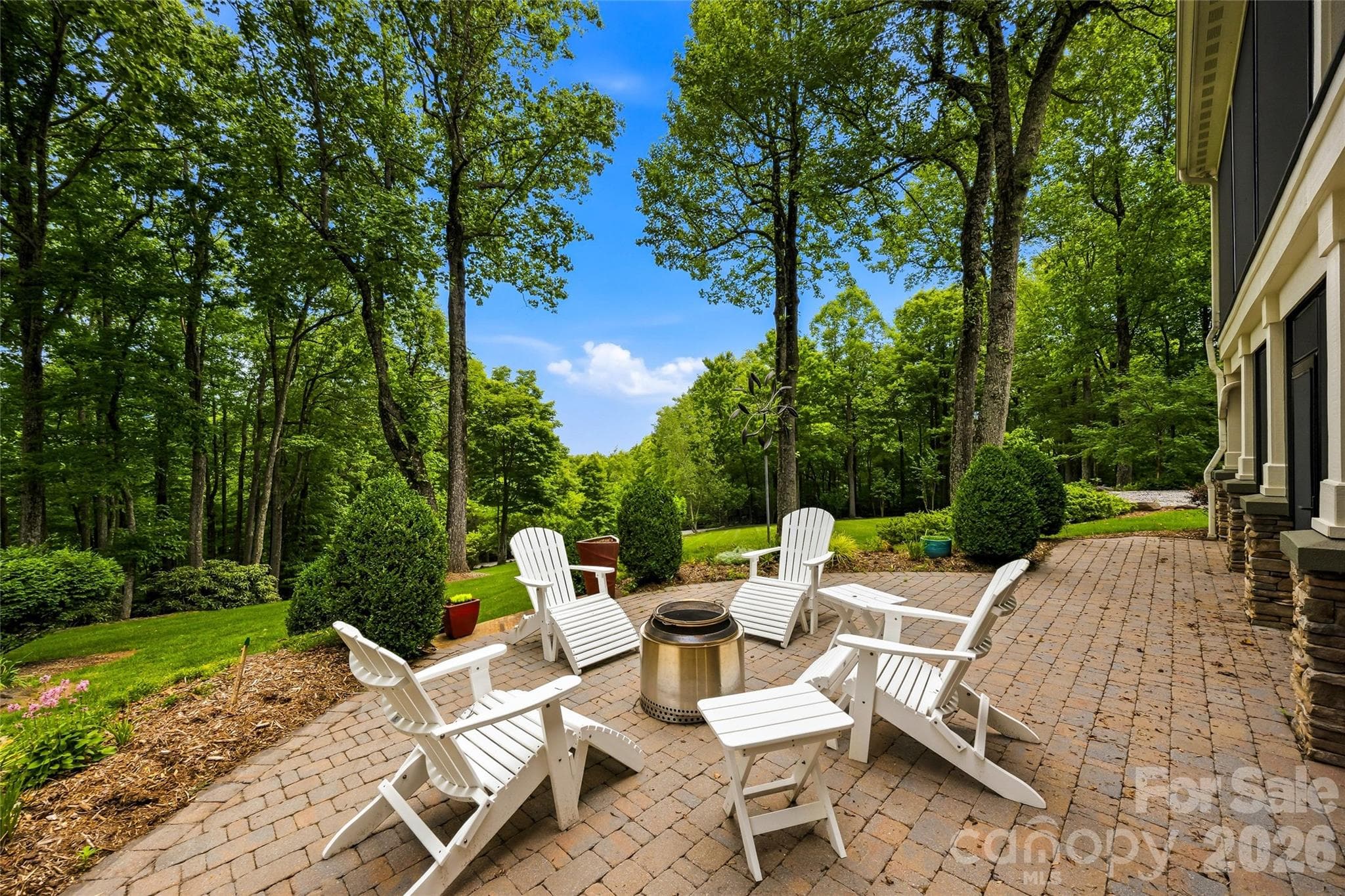 Firepit area on back patio - 233 Tanglewood Lane, Saluda