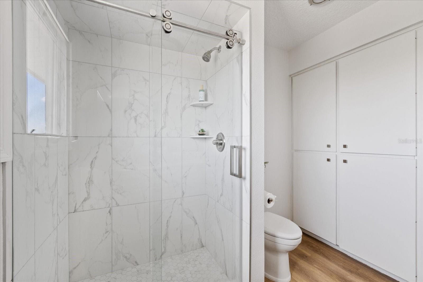 Upstairs shower in hallway bathroom - 5623 HULL CT, NEW PORT RICHEY