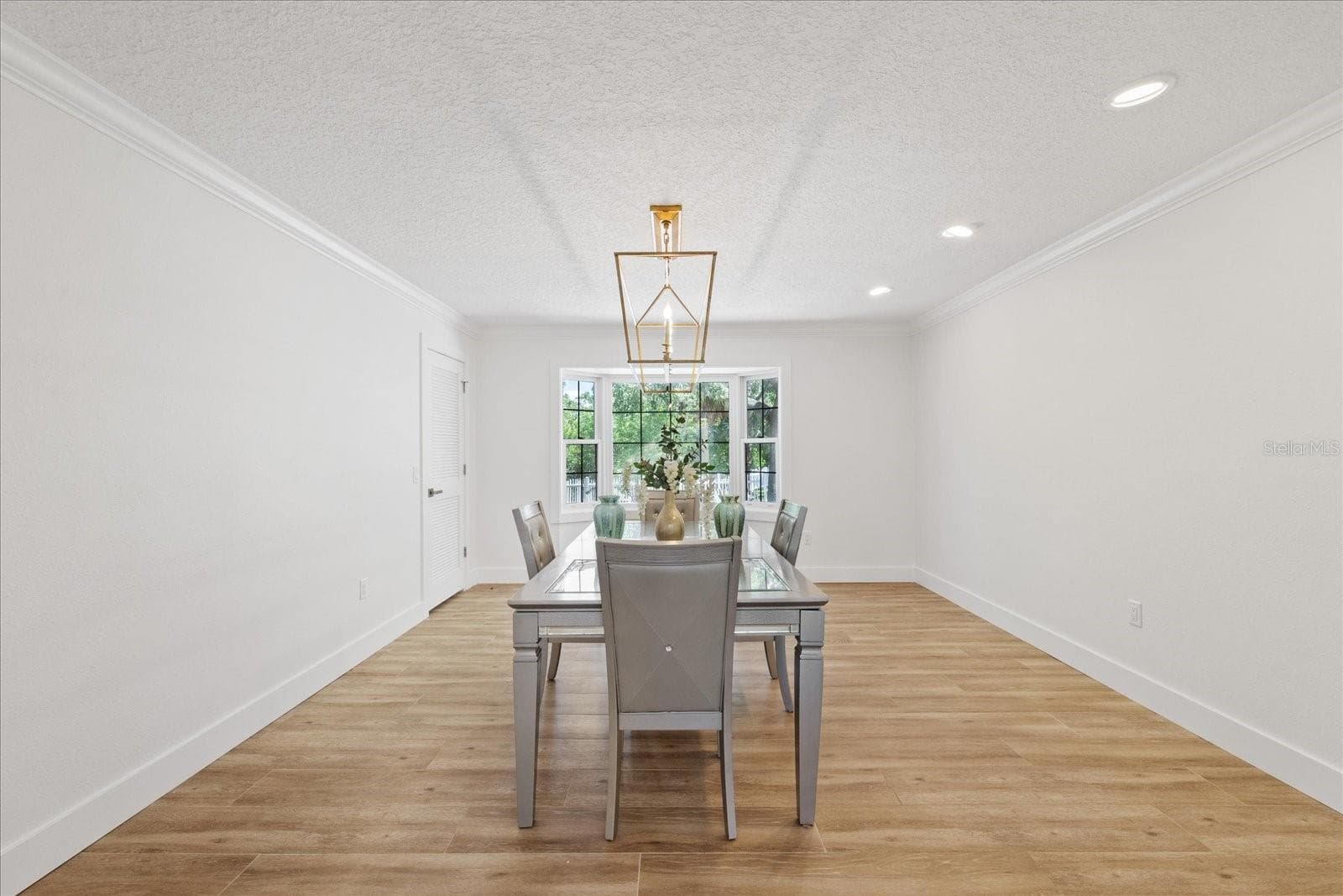 Elegant Dining room with storage. - 5623 HULL CT, NEW PORT RICHEY