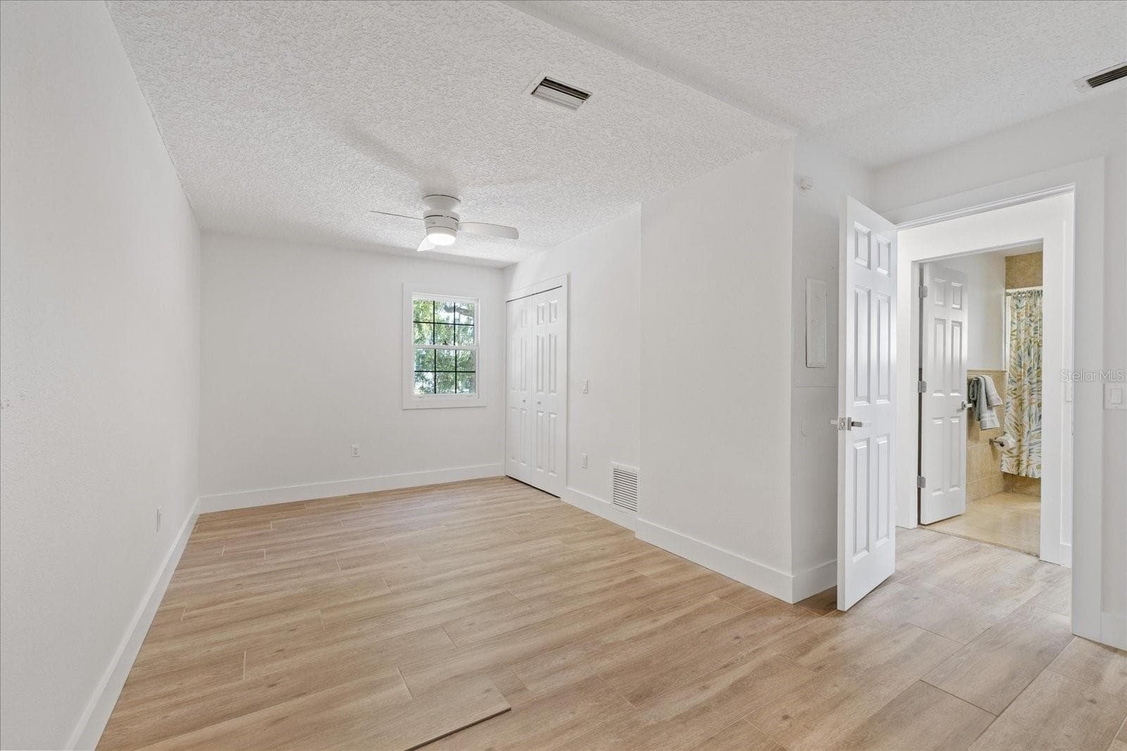 First floor guest bedroom - 5623 HULL CT, NEW PORT RICHEY