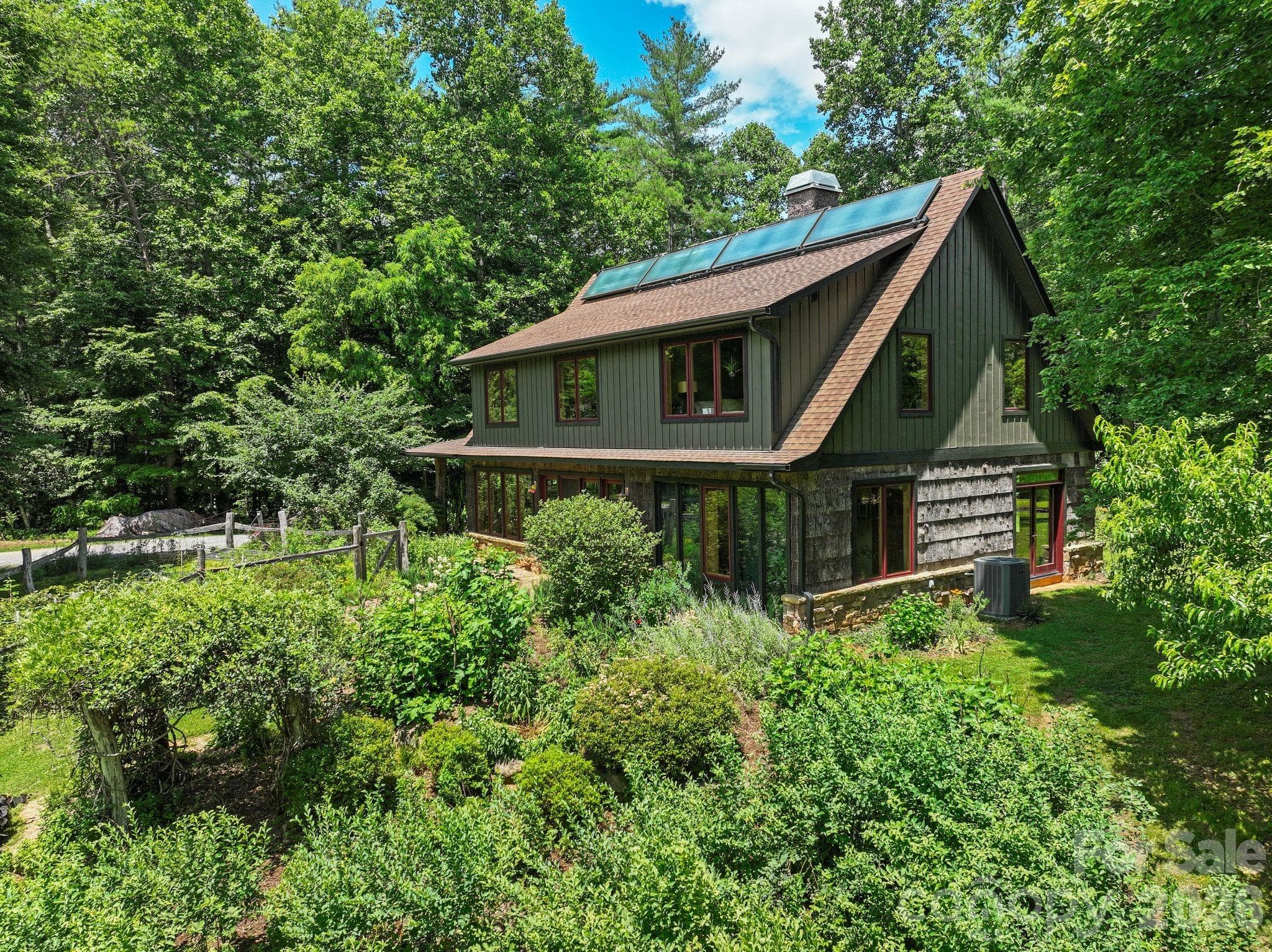 side yard features abundant blueberries and mature landscaping - Arden