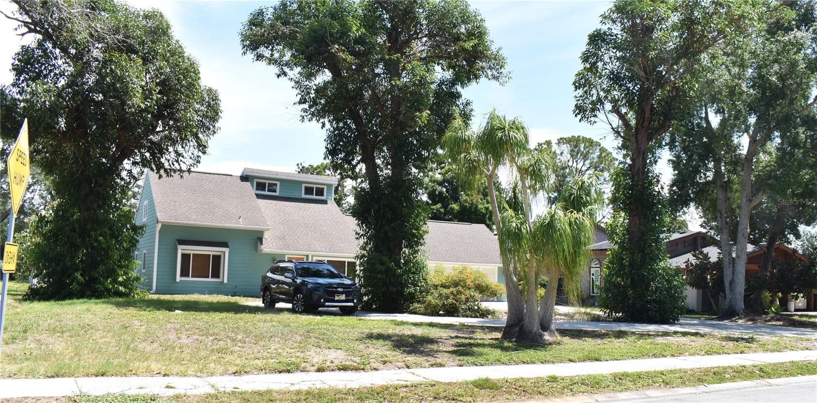 Front of House with circular Driveway - 7606 15TH AVE NW, BRADENTON