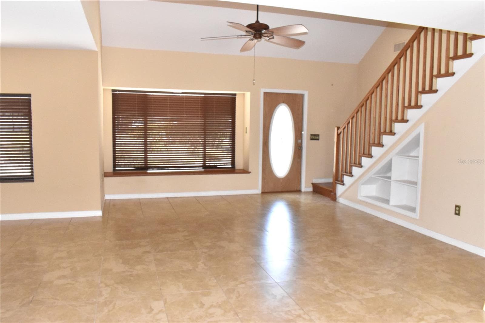 Living Room with Stairs to 2nd floor Suite - 7606 15TH AVE NW, BRADENTON