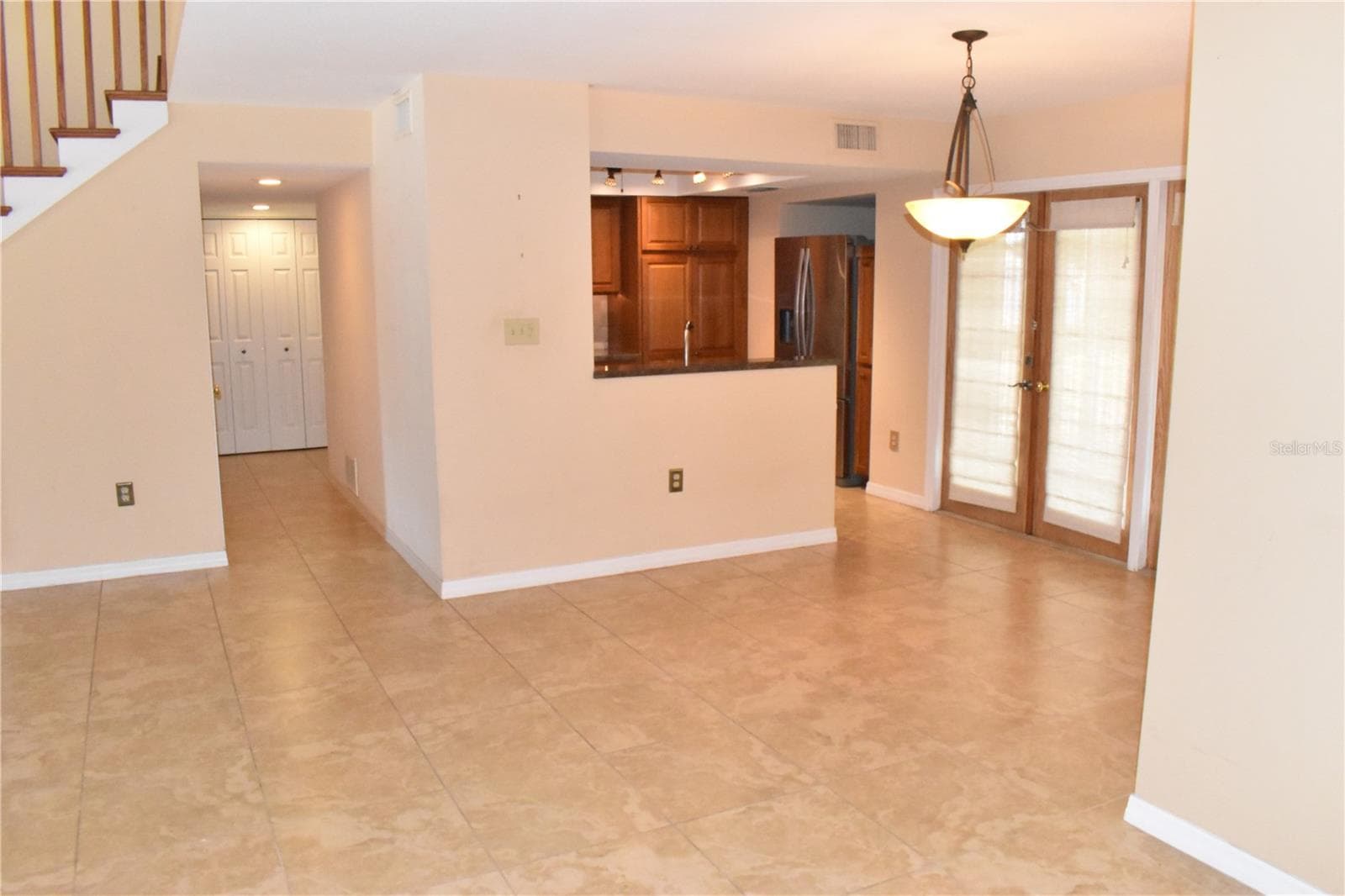 Dining Room with Kitchen & Hall to 2 Bedrooms - 7606 15TH AVE NW, BRADENTON