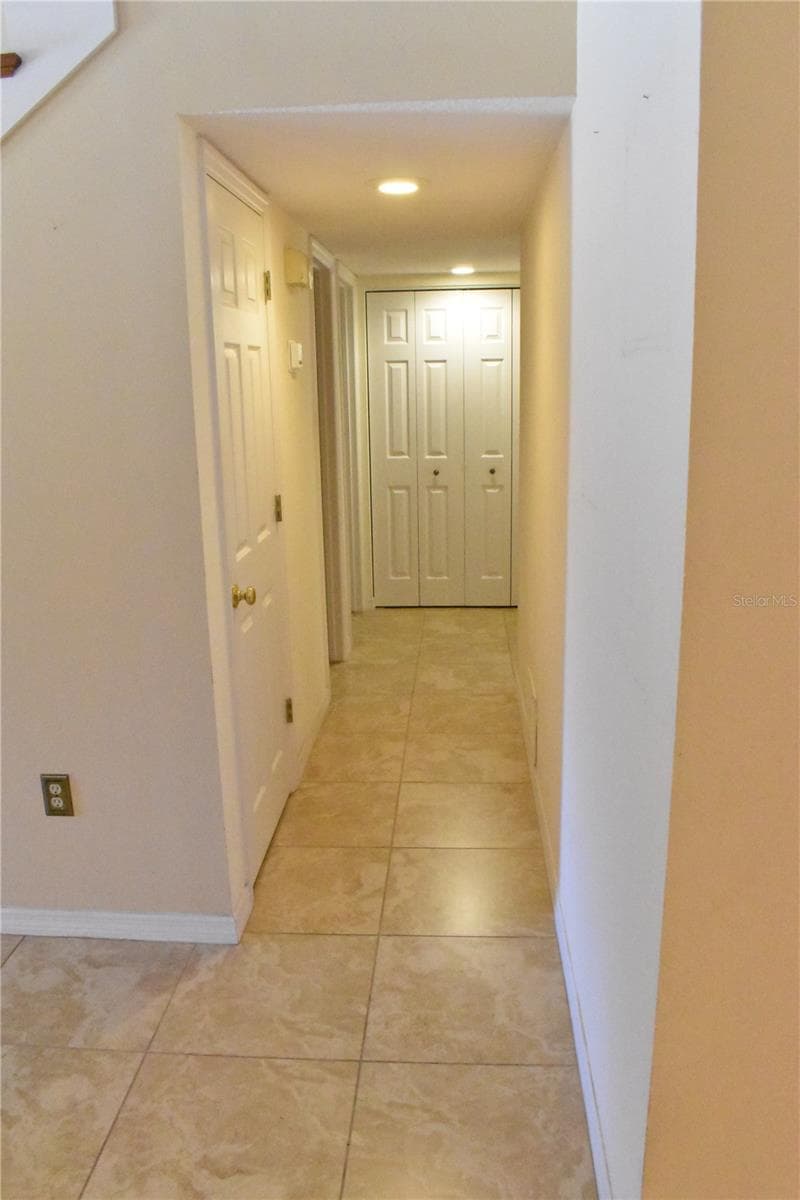 1st Floor Hallway to Jack & Jill Bathroom and Bedrooms - 7606 15TH AVE NW, BRADENTON