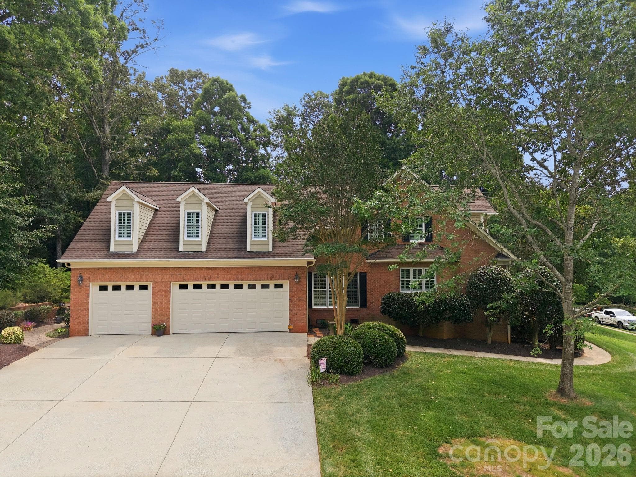Side load 3 car garage with access to back patio - Waxhaw