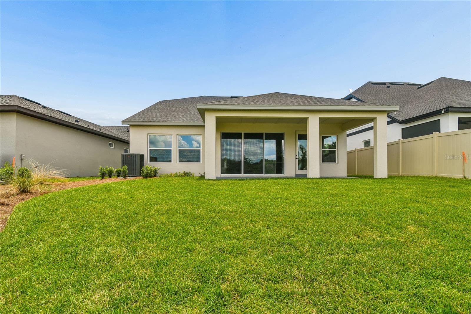 Rear Exterior - 5735 LEAFLET TRAIL, MOUNT DORA