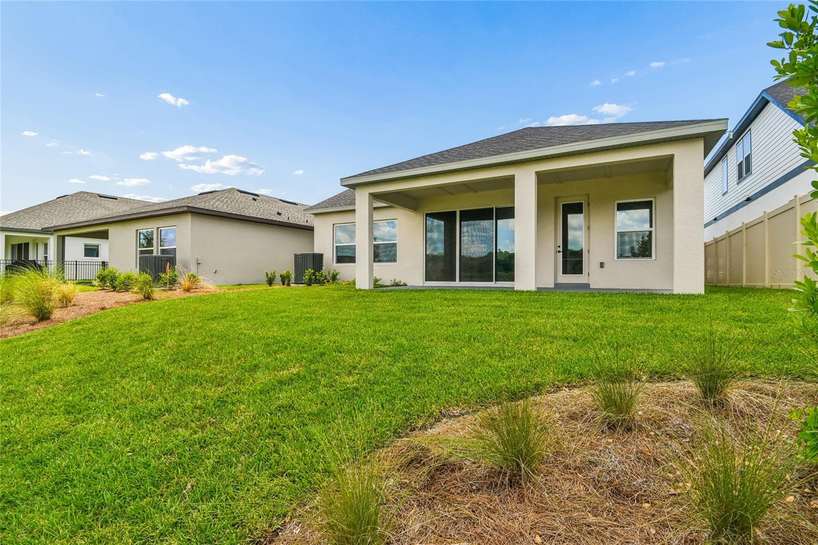 Rear Exterior - 5735 LEAFLET TRAIL, MOUNT DORA