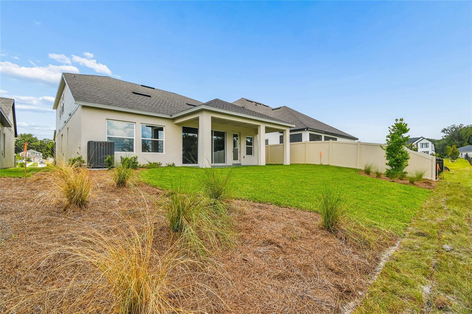 Rear Exterior - 5735 LEAFLET TRAIL, MOUNT DORA