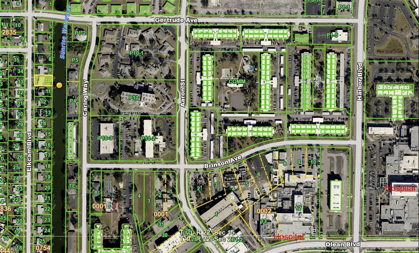 Aerial map showing home, canal, Fawcett Hospital, and Advent Hospital - 2440 ELKCAM BLVD, PORT CHARLOTTE
