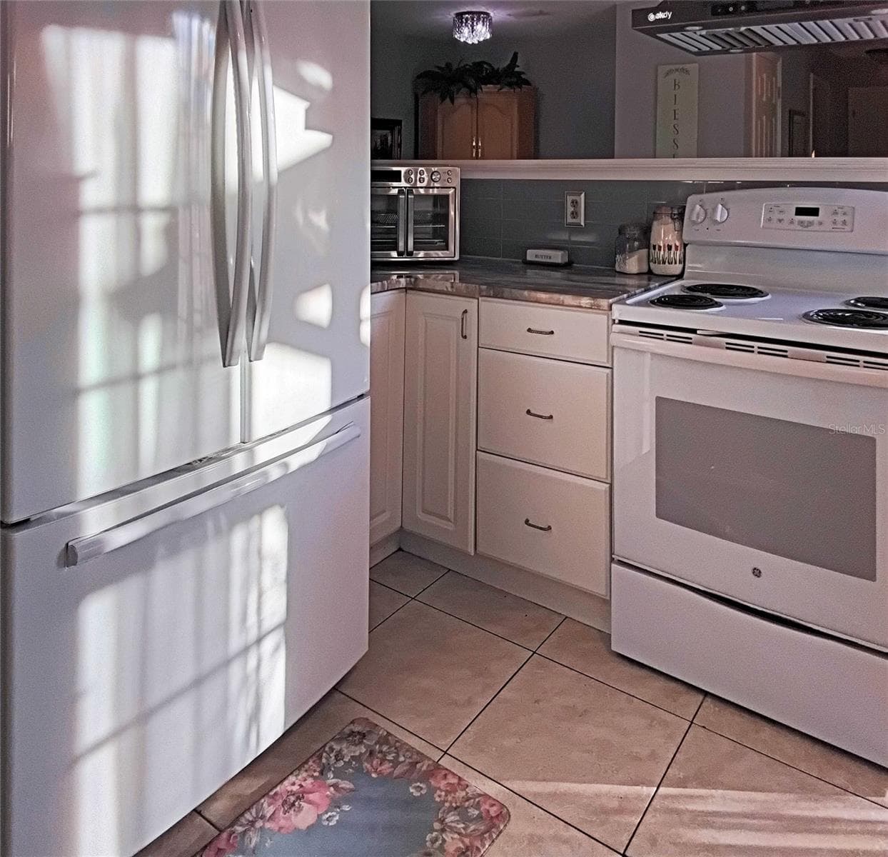 Refrigerator, range and countertop to pass through / breakfast bar - 2440 ELKCAM BLVD, PORT CHARLOTTE