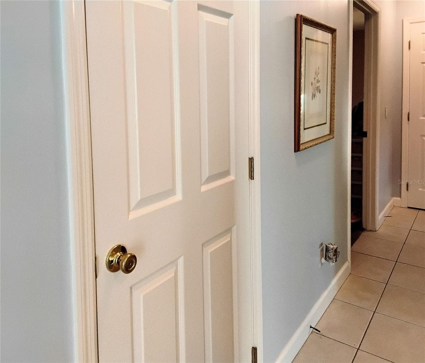 Left side of hallway leading to bedrooms - 2440 ELKCAM BLVD, PORT CHARLOTTE