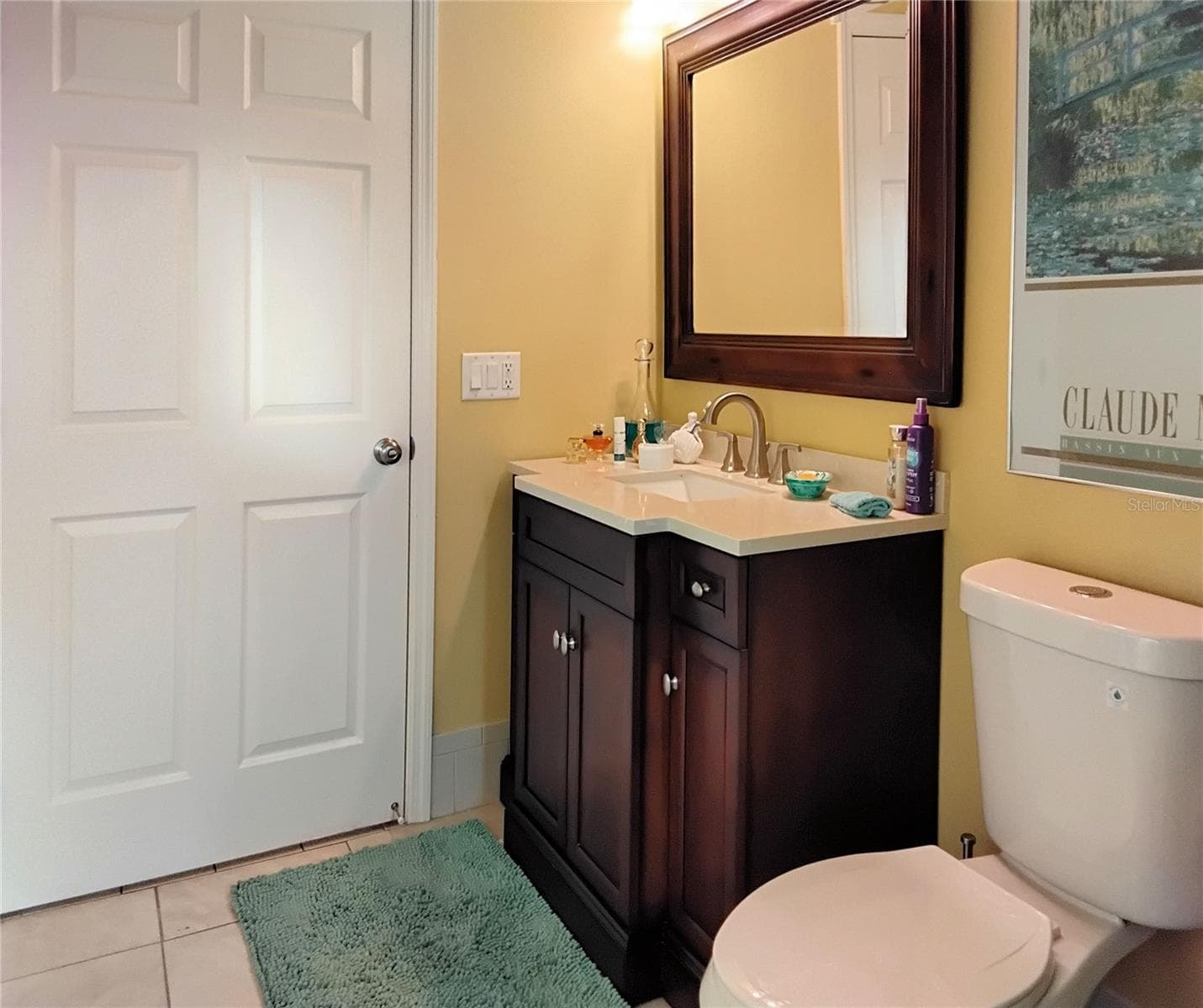 Vanity in main bathroom - 2440 ELKCAM BLVD, PORT CHARLOTTE