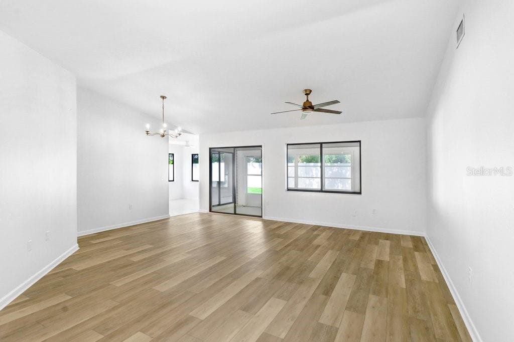 Front door to Living /Dining Rm; Dinette & Kitchen to the left. - 4949 PLEASANT HOLLOW TRL #211, LAKELAND