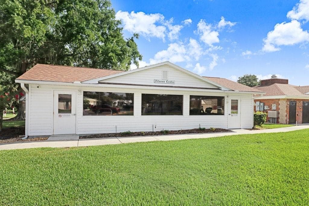 Entrances to POA office and workout room. Clubhouse to the right and mailboxes to the rear. - 4949 PLEASANT HOLLOW TRL #211, LAKELAND