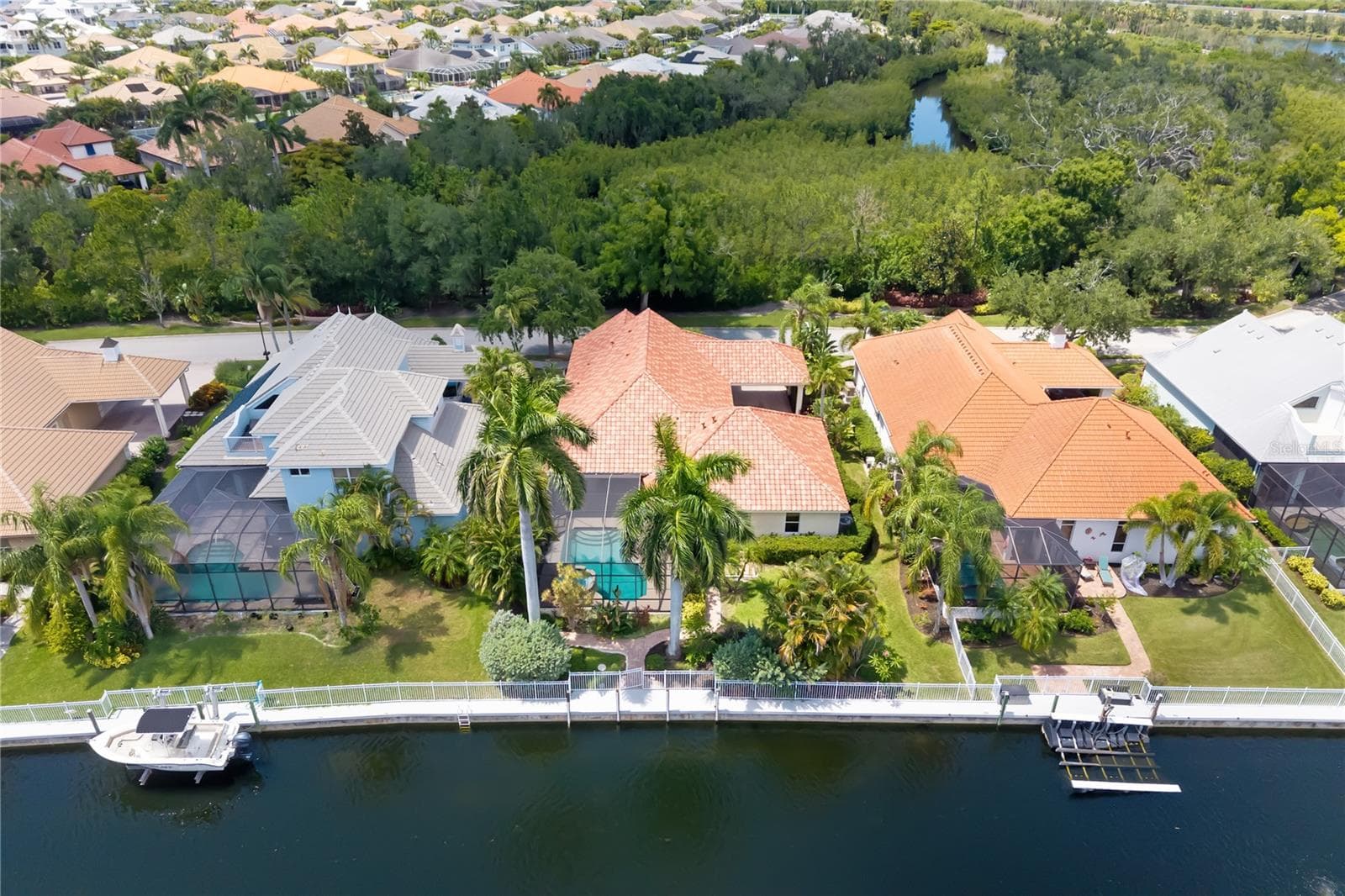 BRING YOUR BOAT, HARBOUR WALK WATERFRONT LIVING! PRIVATE DOCK, POOL, NEW ROOF, OFFICE/DEN, GATED COMMUNITY, NO CDD - 4770 MAINSAIL DR, BRADENTON