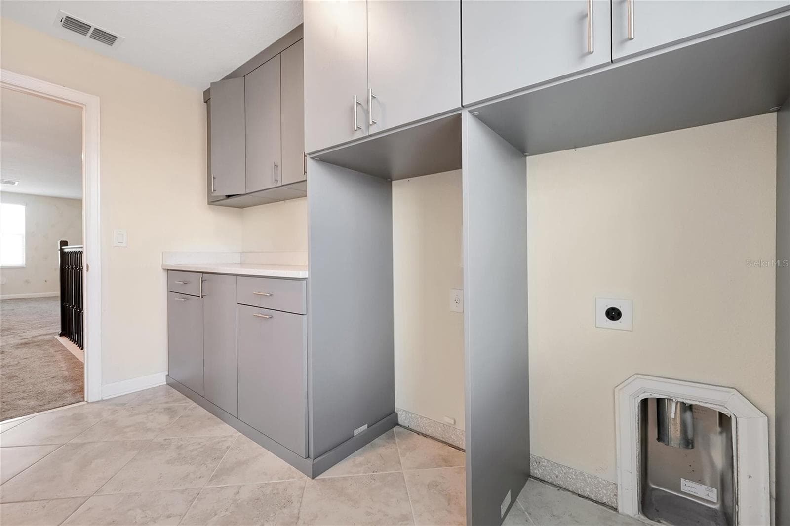 Laundry Room with custom-built cabinets - 12151 IMAGINARY WAY, ORLANDO