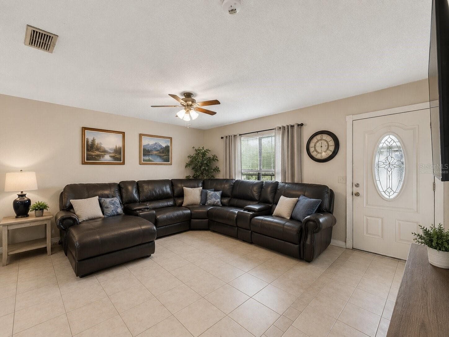 Virtually Staged LivingRoom_1018RedBayTer_PortCharlotte_NaturalLight_Entry.jpg - 1018 RED BAY TER NW, PORT CHARLOTTE