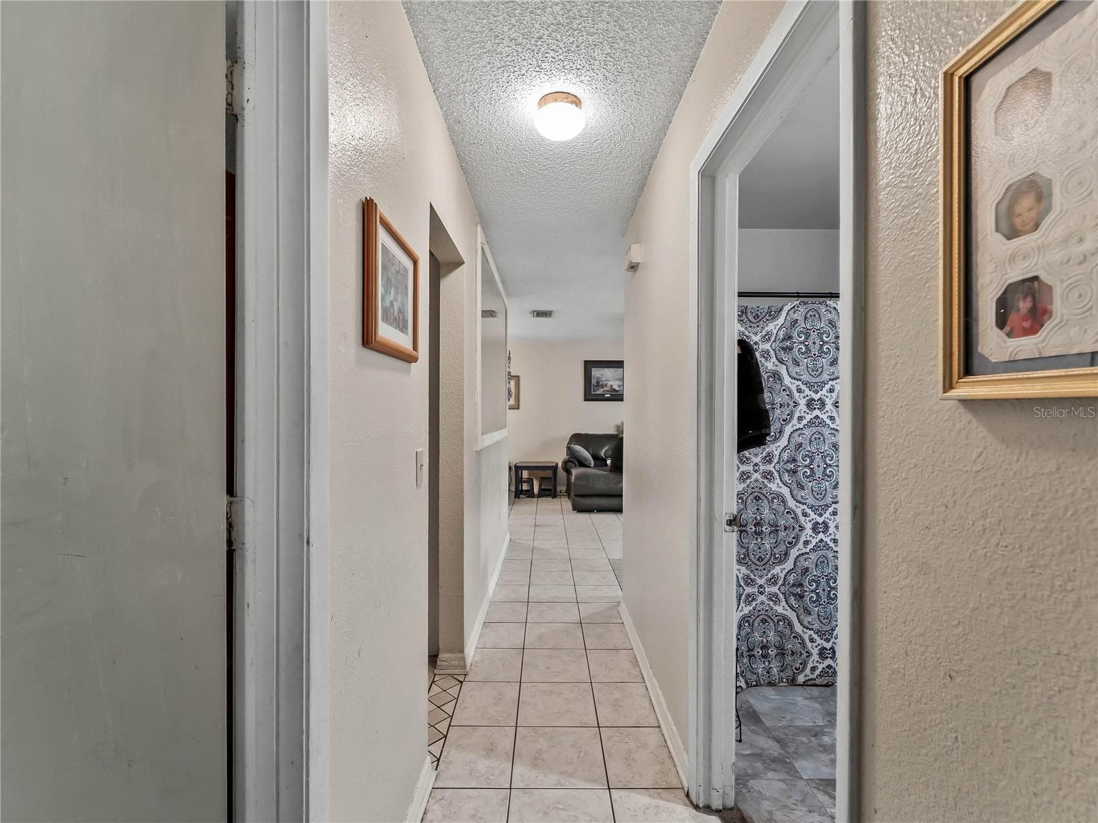 Hallway_1018RedBayTer_PortCharlotte_NaturalLight_Entry.jpg - 1018 RED BAY TER NW, PORT CHARLOTTE