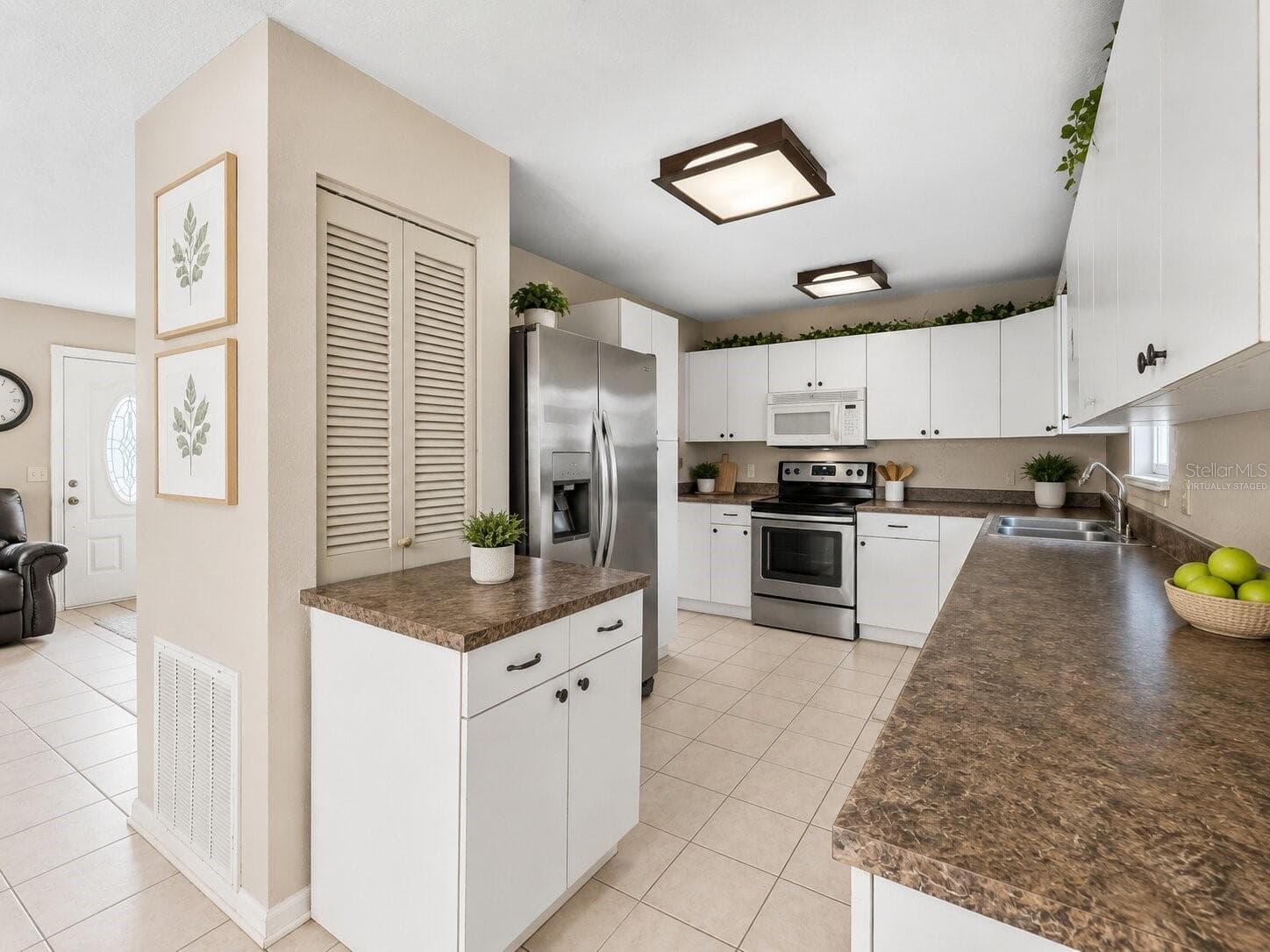 Virtually StagedKitchen_1018RedBayTer_PortCharlotte_OpenConcept_Entry.jpg - 1018 RED BAY TER NW, PORT CHARLOTTE