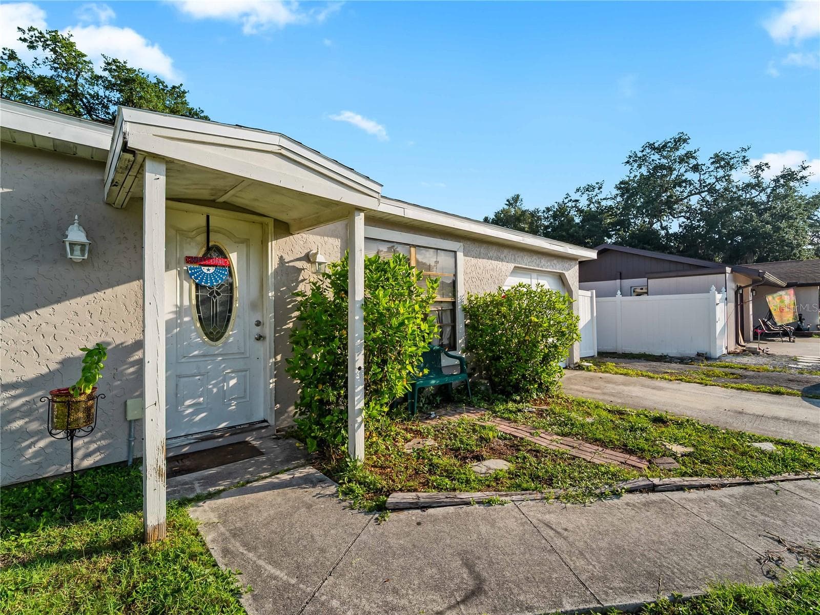 FrontPorch_1018RedBayTer_PortCharlotte_CoveredEntry_Entry.jpg - 1018 RED BAY TER NW, PORT CHARLOTTE