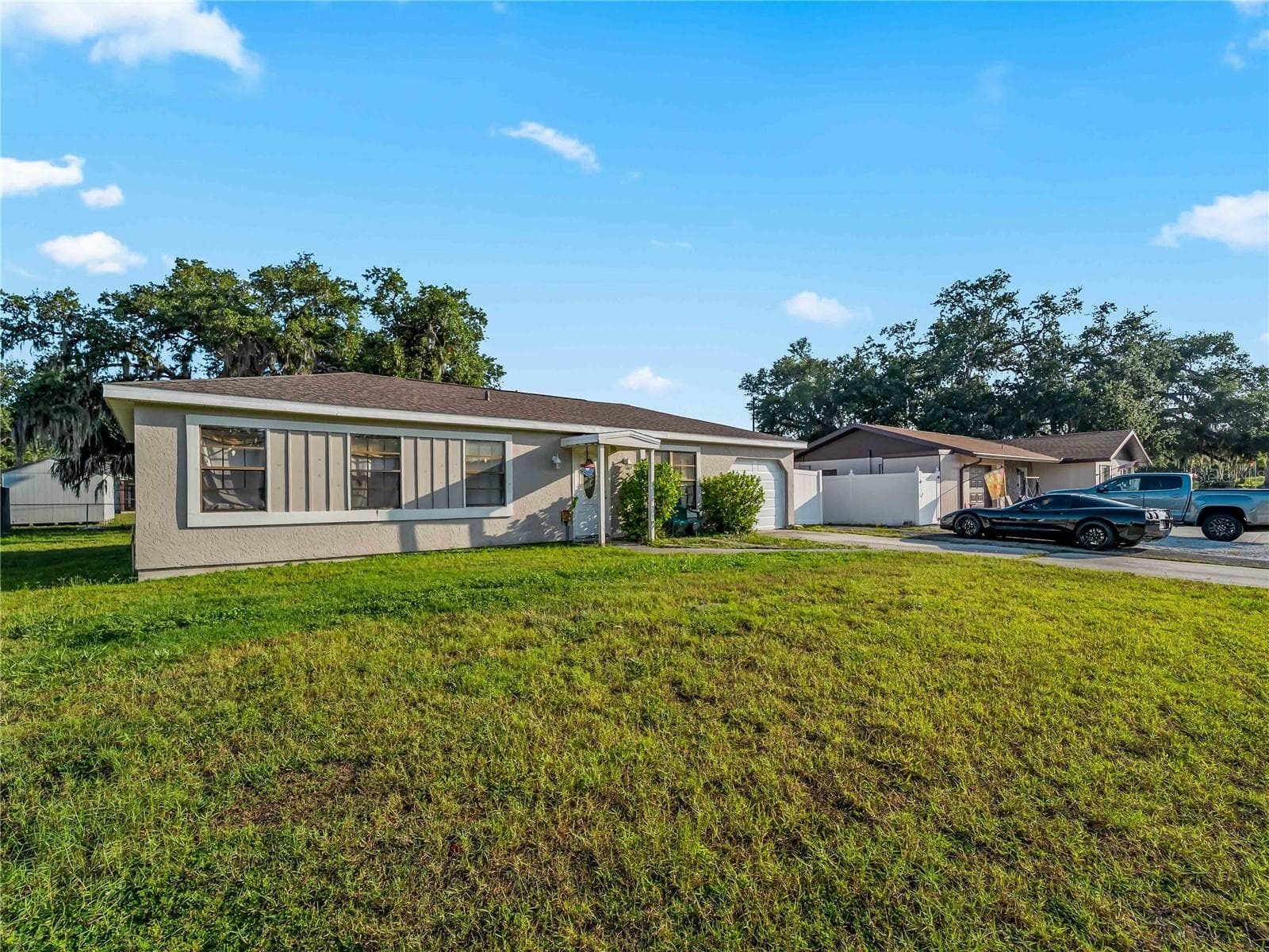 FrontExterior_1018RedBayTer_PortCharlotte_CornerLot_Daylight.jpg - 1018 RED BAY TER NW, PORT CHARLOTTE