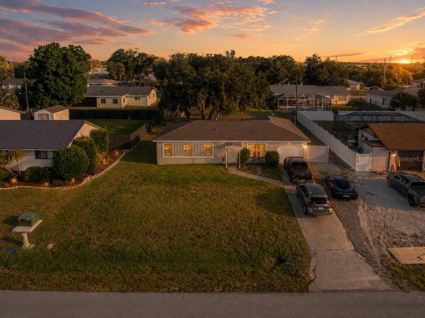 Twilight Backyard_1018RedBayTer_PortCharlotte_FencedBackyard_Daylight.jpg - 1018 RED BAY TER NW, PORT CHARLOTTE