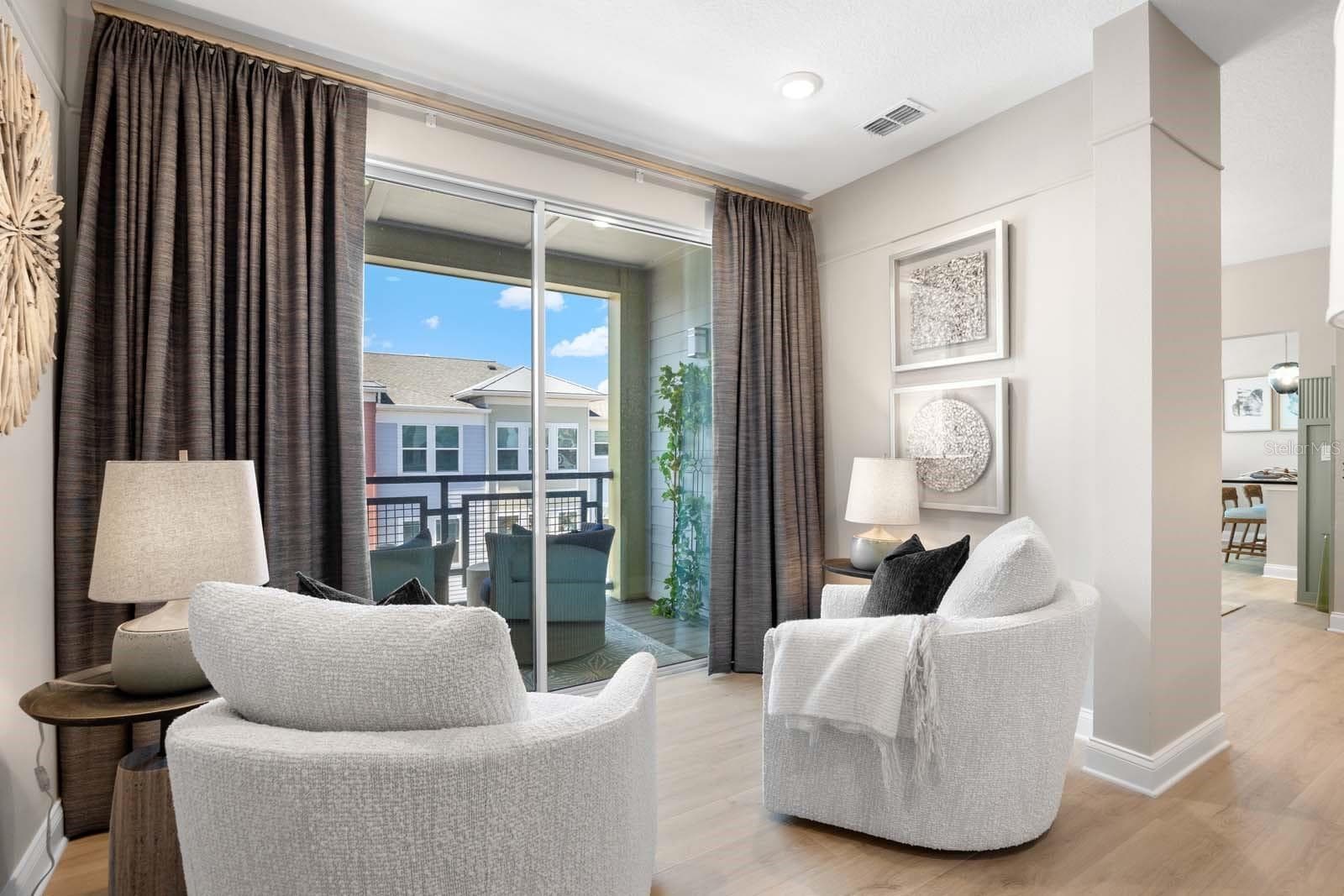 Seating Area and Balcony - 7557 LAUREATE BLVD #6407, ORLANDO