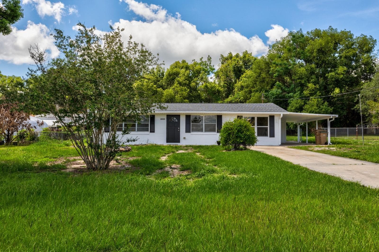 Daytime Front Exterior - 5222 EAGLES NEST RD, FRUITLAND PARK