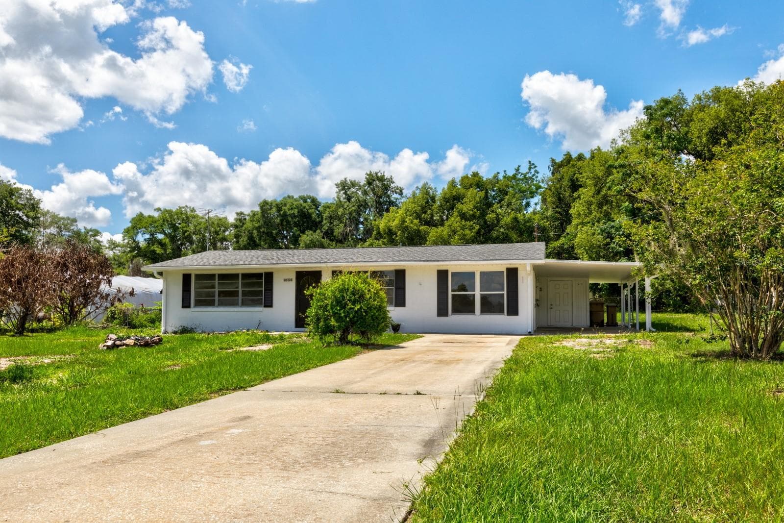 Front from driveway - 5222 EAGLES NEST RD, FRUITLAND PARK