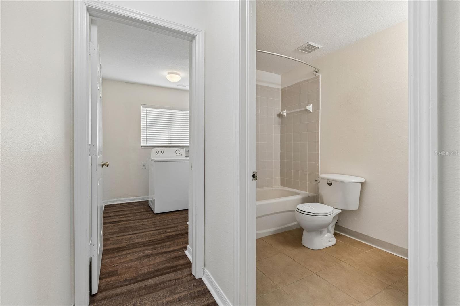 1st Floor bathroom and laundry room - 3307 PINE TOP DR, VALRICO