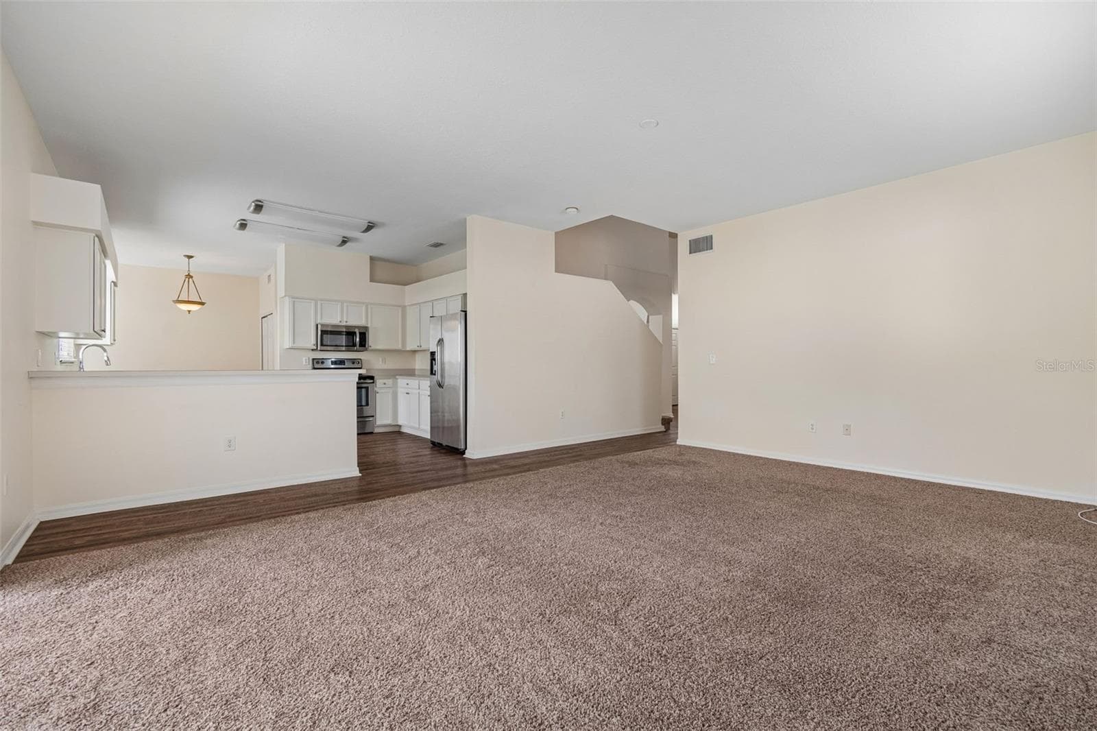 Living Room off of the kitchen - 3307 PINE TOP DR, VALRICO