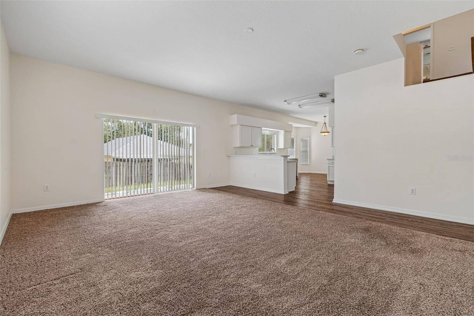 Living Room off of the kitchen - 3307 PINE TOP DR, VALRICO