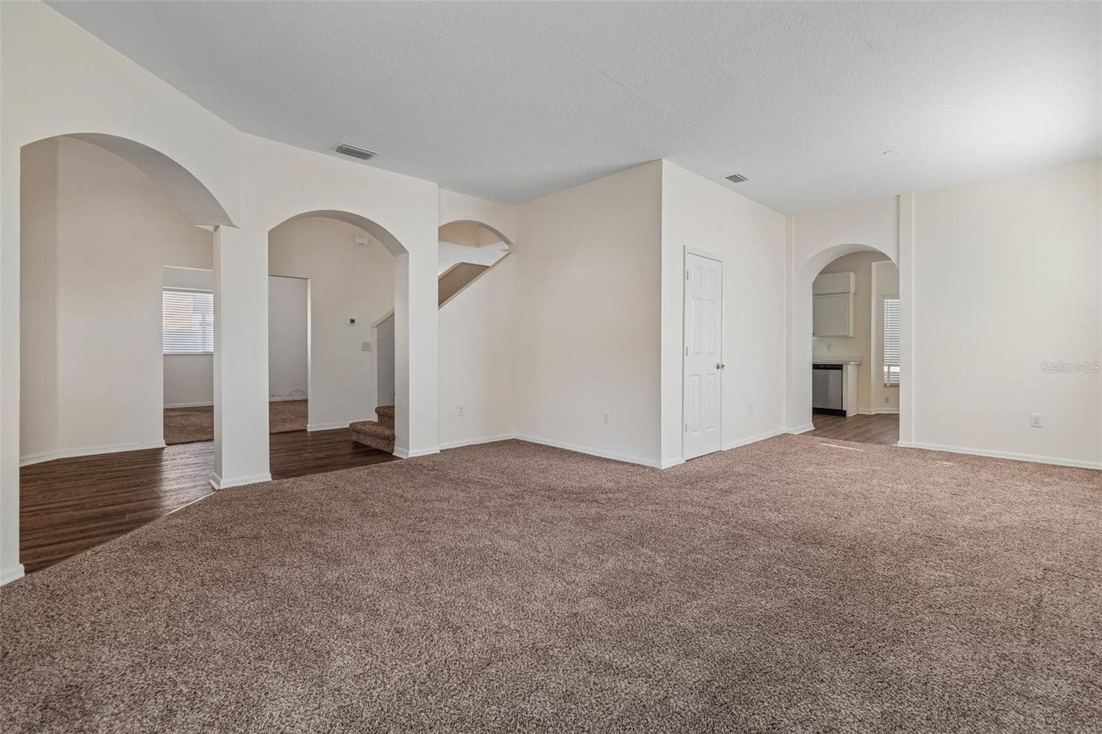 Family Room looking towards office/den on one side and kitchen on the other - 3307 PINE TOP DR, VALRICO