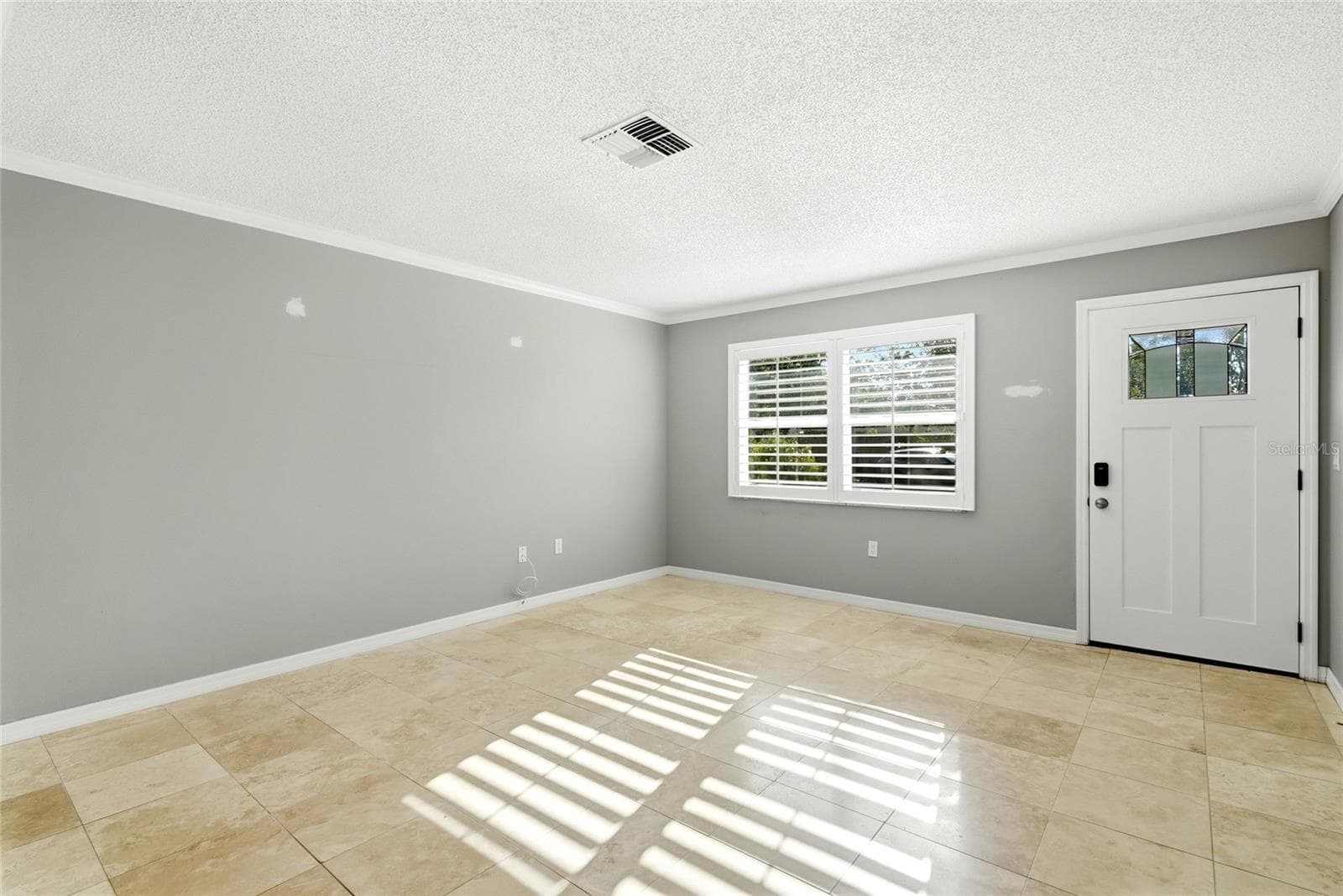 2310 living room or dining room near front door - 2310 29TH ST N, ST PETERSBURG